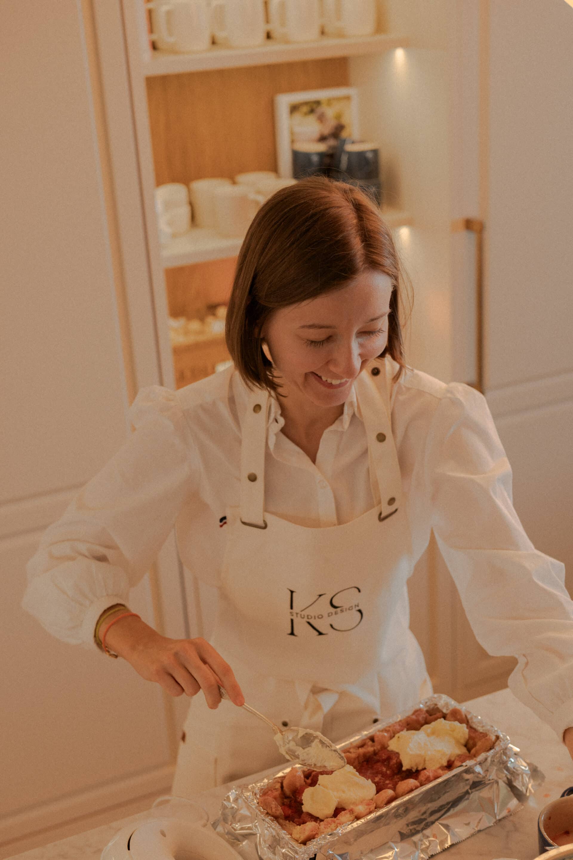 b18c8c634161cb4b79e1bf3574117bb79be344ff KS in the kitchen, preparing her bespoke Strawberry Charlotte